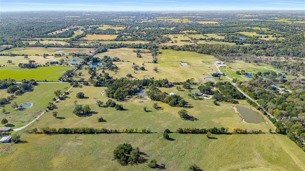 11631 Hiram Road Wills Point, TX 75169 - Photo 2 of 31 an aerial view of residential houses with outdoor space