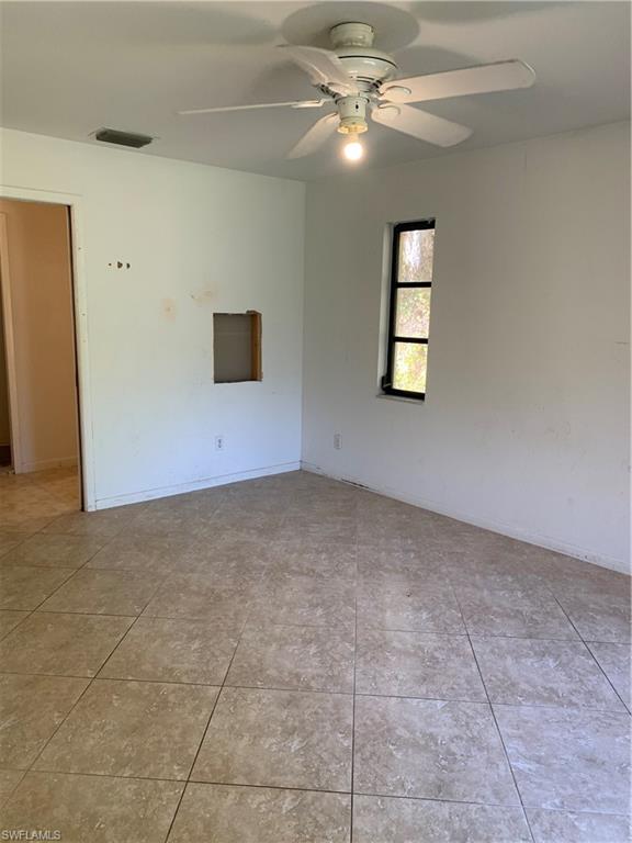 540 2nd Street Southeast Naples, FL 34117 - Photo 15 of 27 a view of an empty room with a window