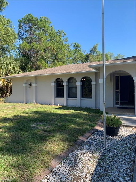 540 2nd Street Southeast Naples, FL 34117 - Photo 2 of 27 a view of a house with backyard