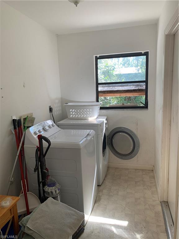 540 2nd Street Southeast Naples, FL 34117 - Photo 26 of 27 a utility room with dryer and washer