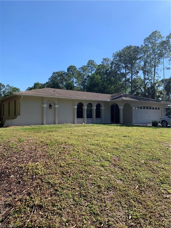 540 2nd Street Southeast Naples, FL 34117 - Photo 4 of 27 a view of house with backyard space and balcony