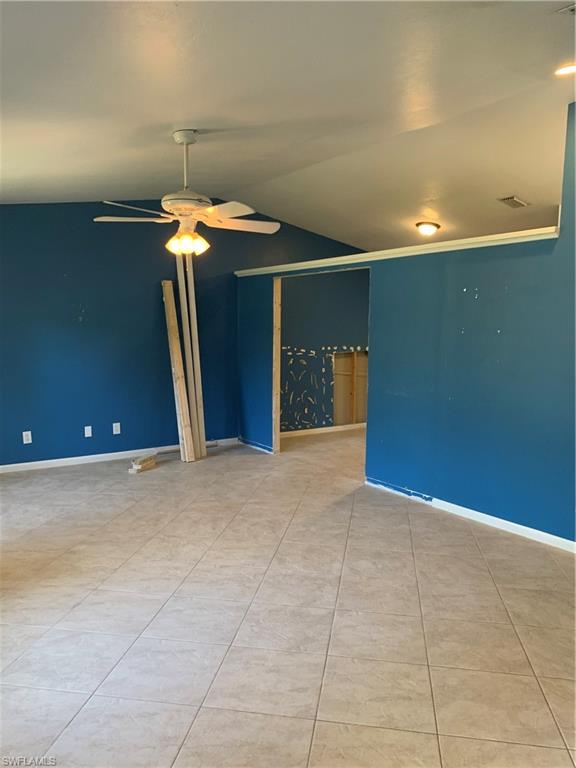 540 2nd Street Southeast Naples, FL 34117 - Photo 5 of 27 a view of an empty room with a fan