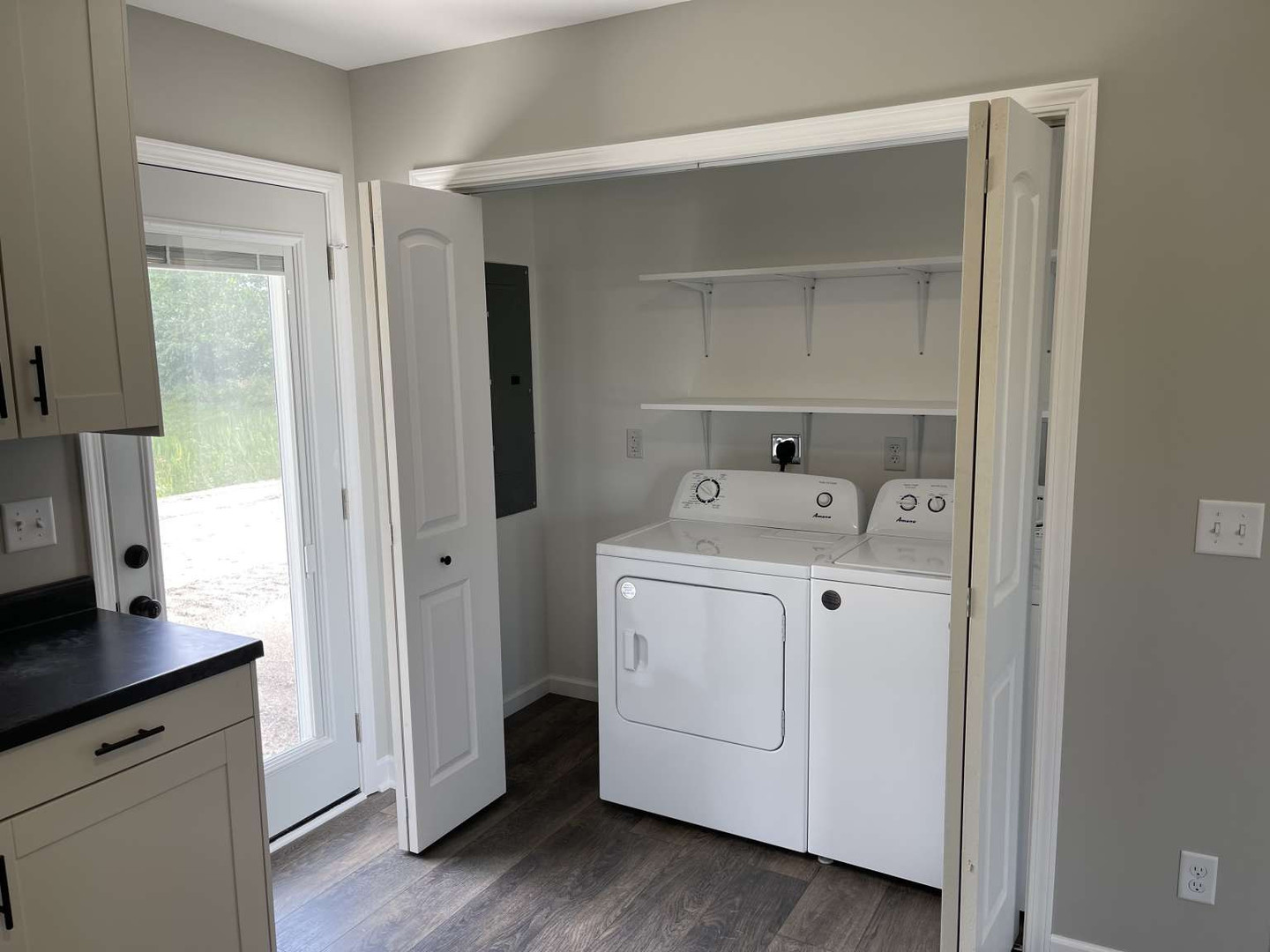 1097 Madison Avenue Braidwood, IL 60408 - Photo 6 of 8 a utility room with cabinets washer and dryer