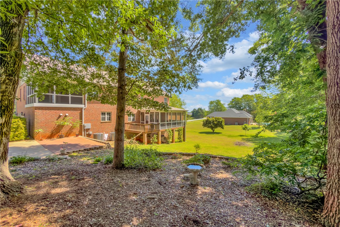 406 Hopewell Ridge Anderson, SC 29621 - Photo 40 of 46 This spacious property offers a serene outdoor living area, perfect for relaxation and entertaining.