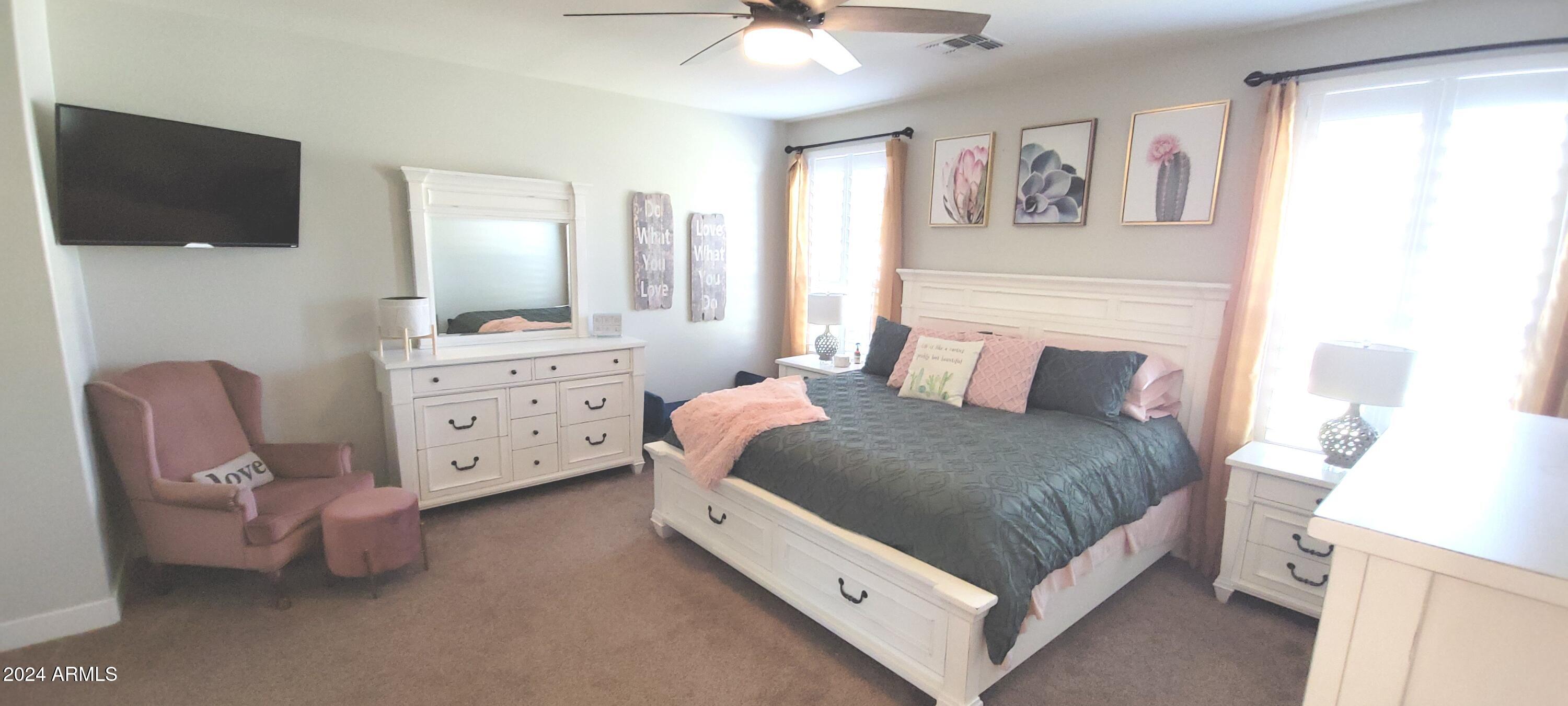 3236 East Phelps Street Gilbert, AZ 85295 - Photo 26 of 50 a bedroom with a bed and a television