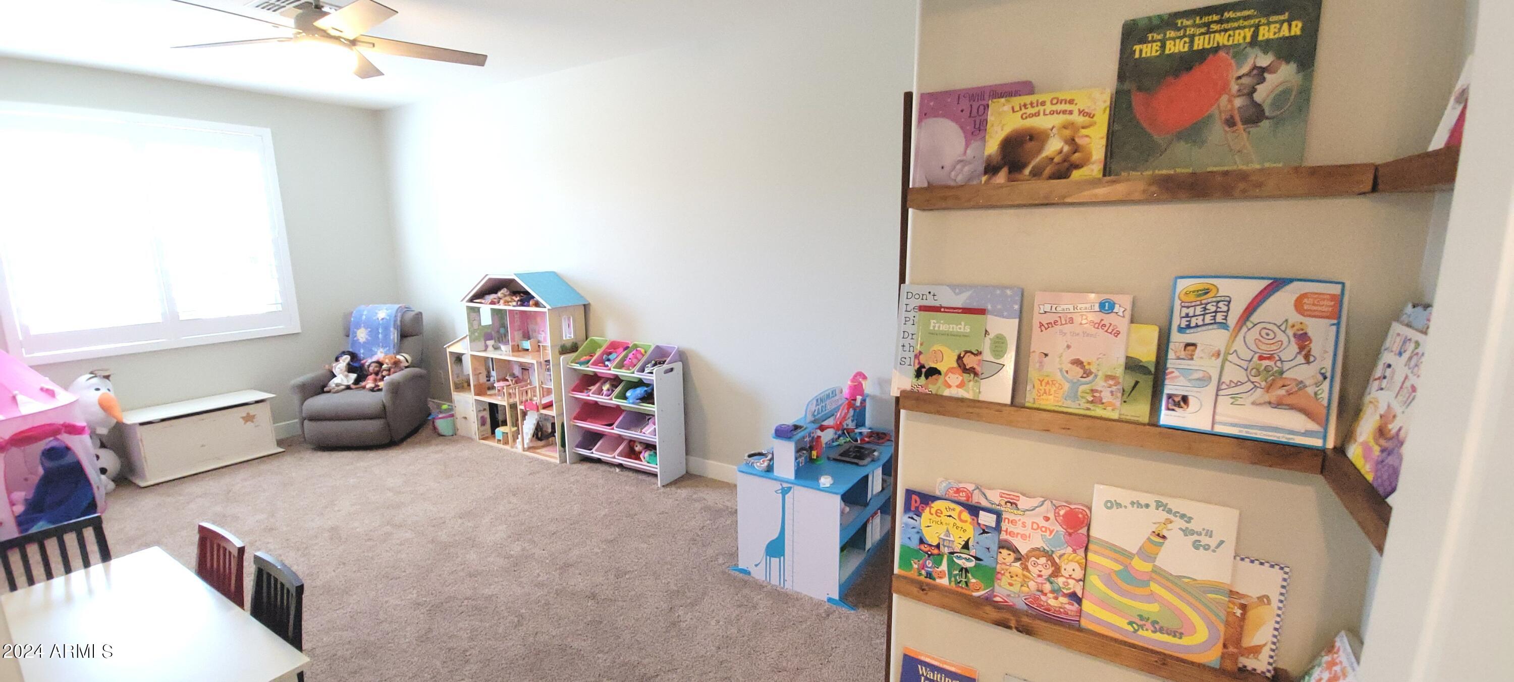 3236 East Phelps Street Gilbert, AZ 85295 - Photo 32 of 50 a bedroom with furniture and a bed