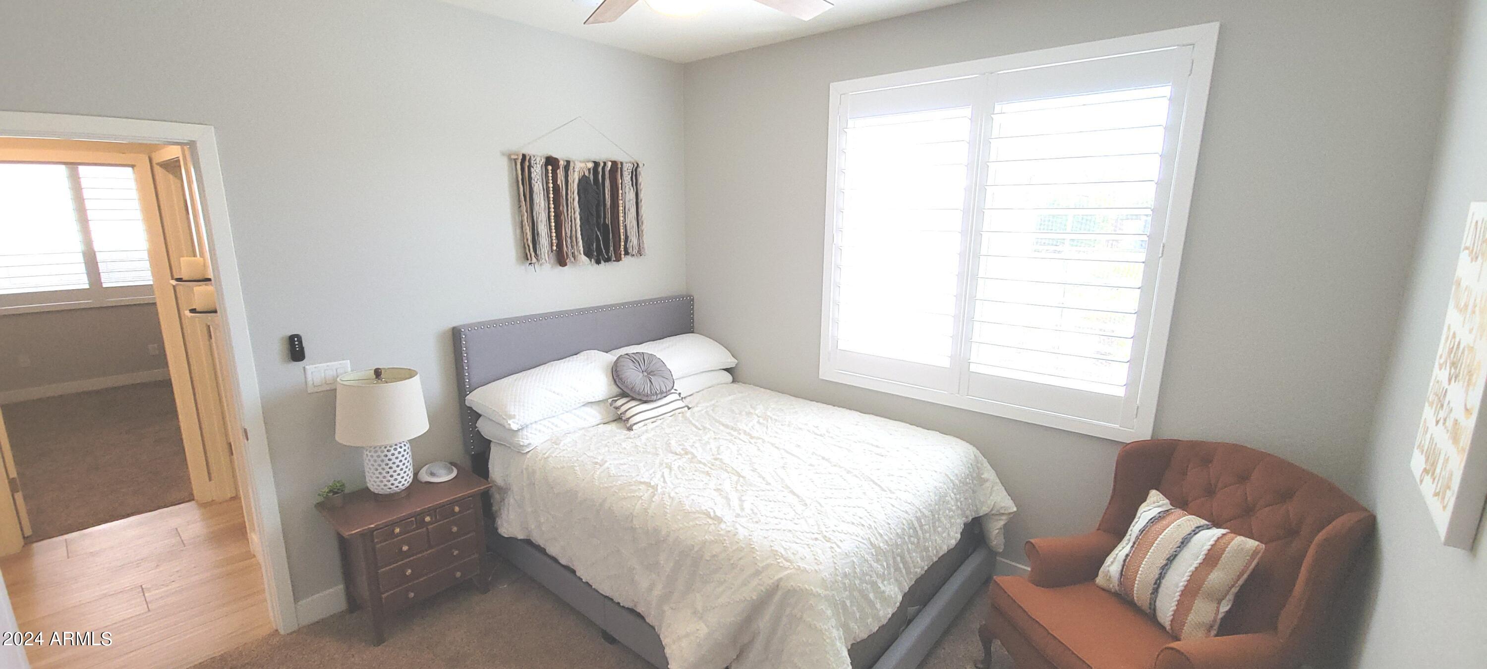 3236 East Phelps Street Gilbert, AZ 85295 - Photo 35 of 50 a bedroom with a bed and a window