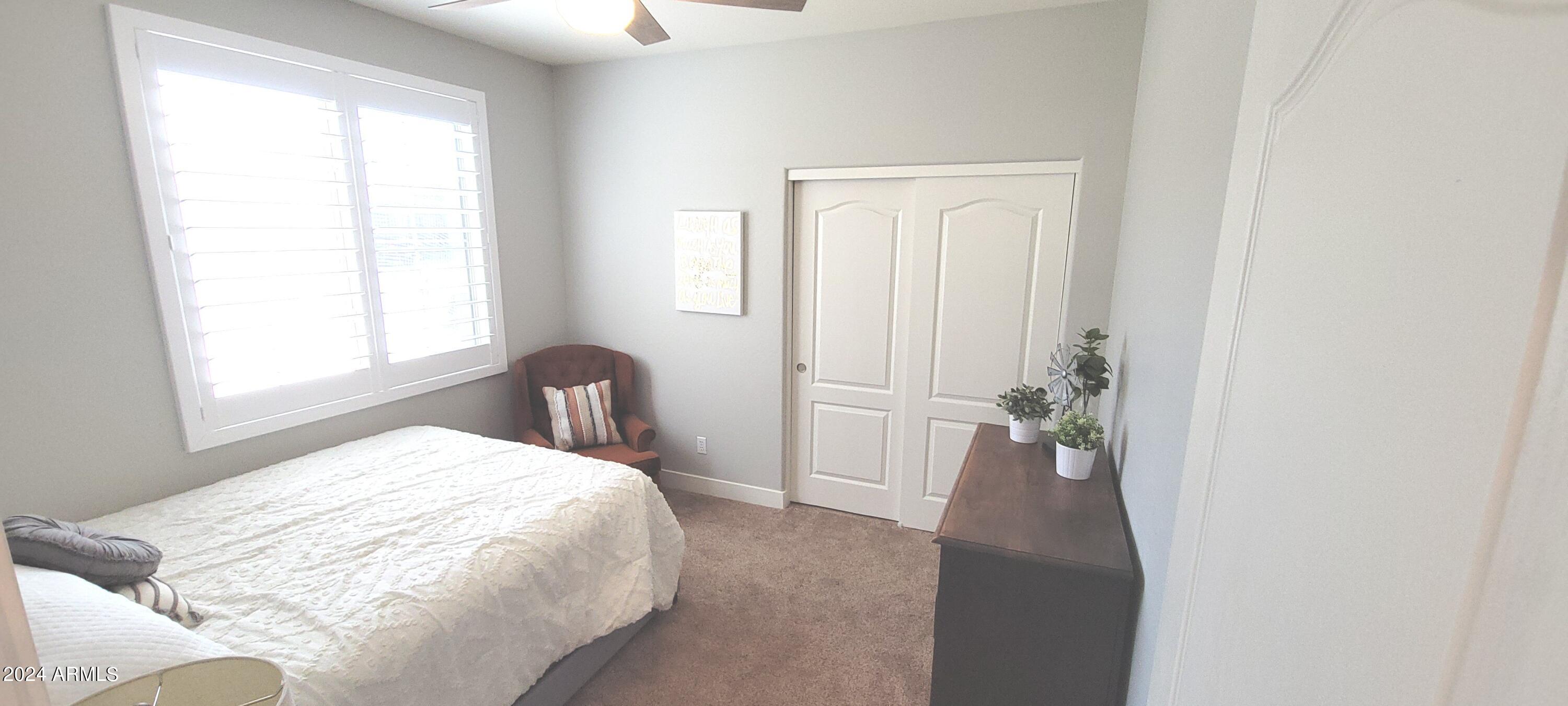 3236 East Phelps Street Gilbert, AZ 85295 - Photo 36 of 50 a bedroom with a bed and a window