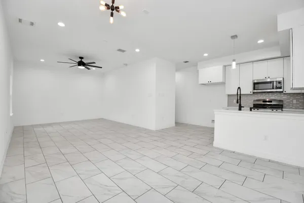 a view of a kitchen with a sink