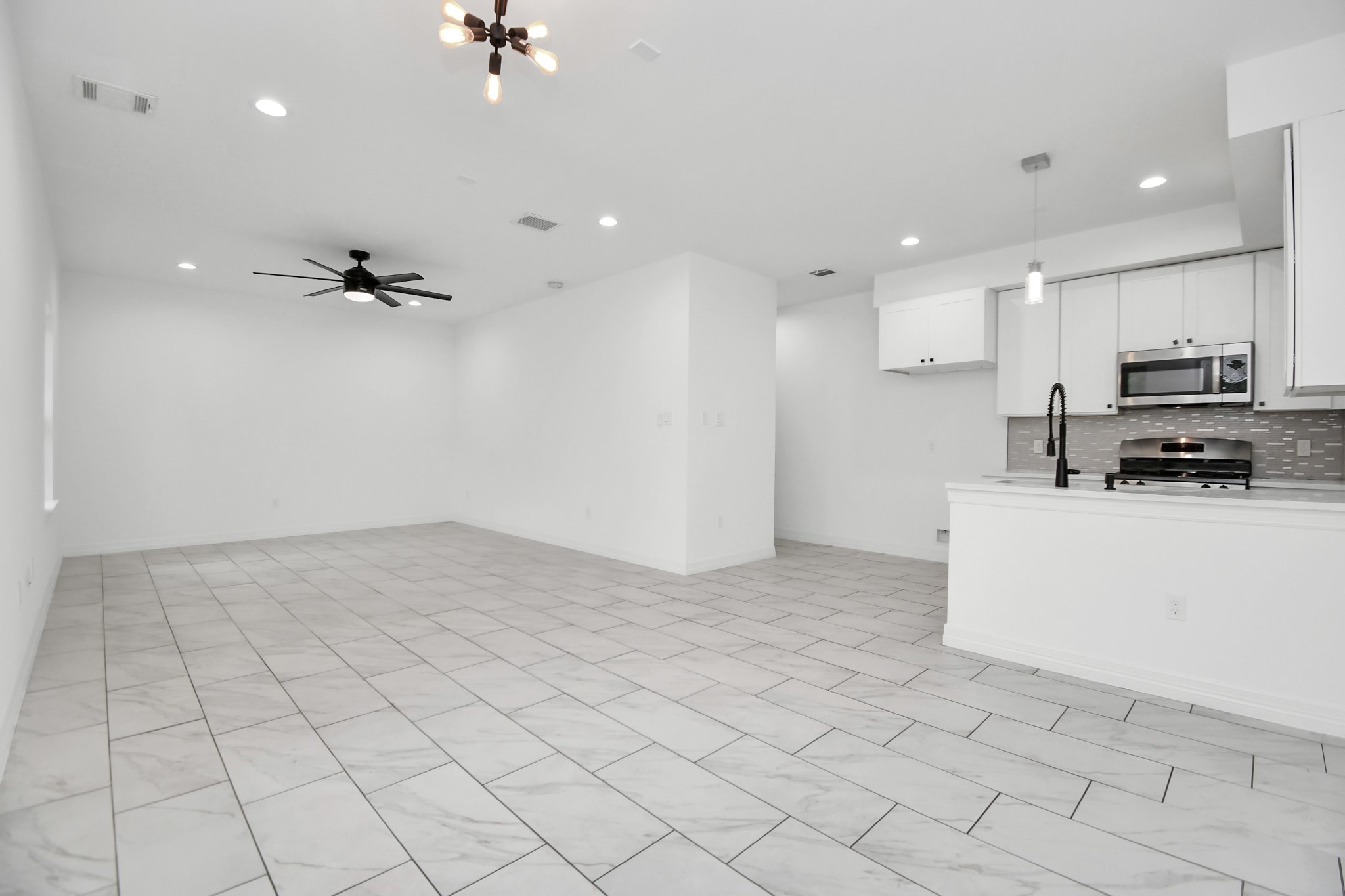9003 Prairie View Drive, Unit B Houston, TX 77088 - Photo 2 of 20 a view of a kitchen with a sink