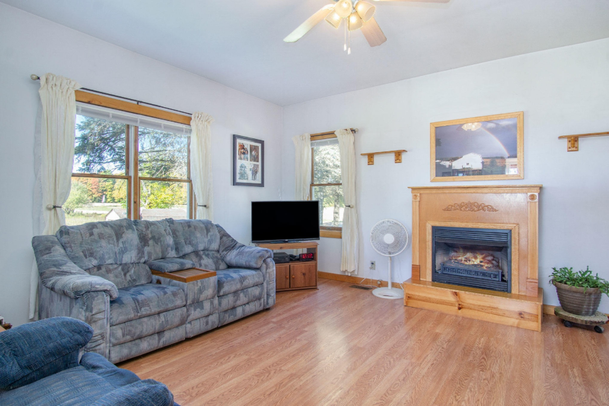 65 East Major Road Scottville, MI 49454 - Photo 9 of 26 Living room with fireplace