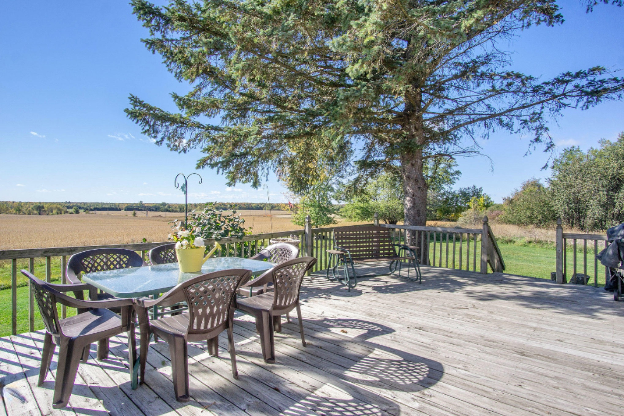 65 East Major Road Scottville, MI 49454 - Photo 10 of 26 Deck with outdoor dining area