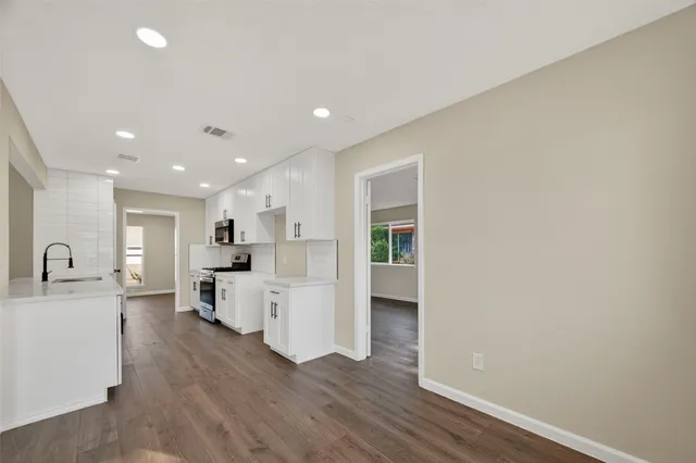 a view of kitchen with breakfast area