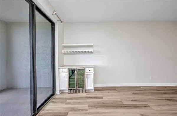 a view of a room with a large window