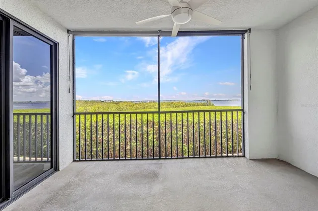 a view of a room with a large window