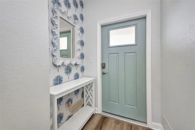 a view of an entryway with a front door