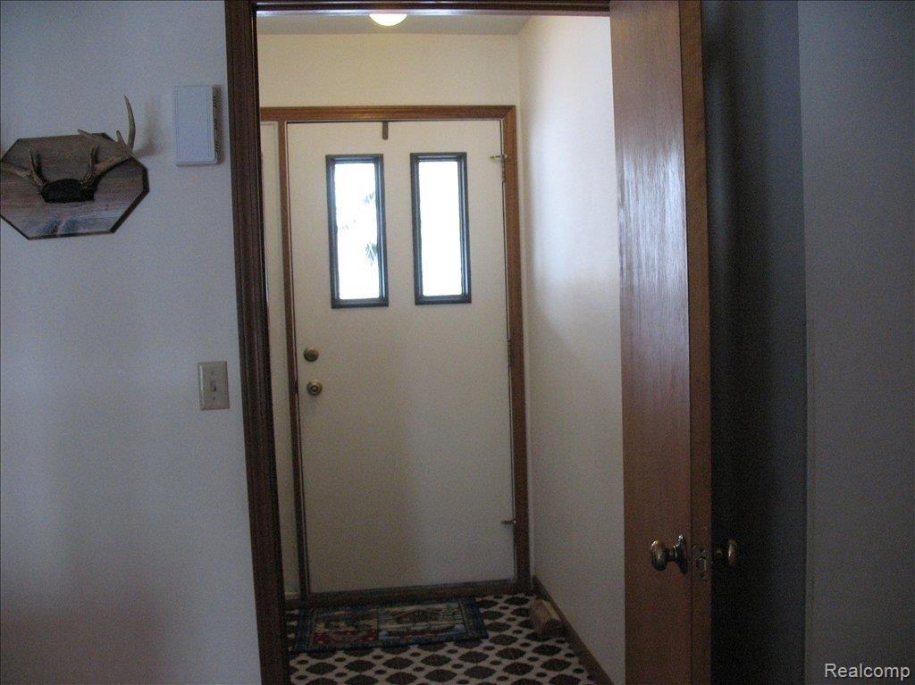 4619 Gregory Road Goodrich, MI 48438 - Photo 19 of 19 Enclosed Foyer