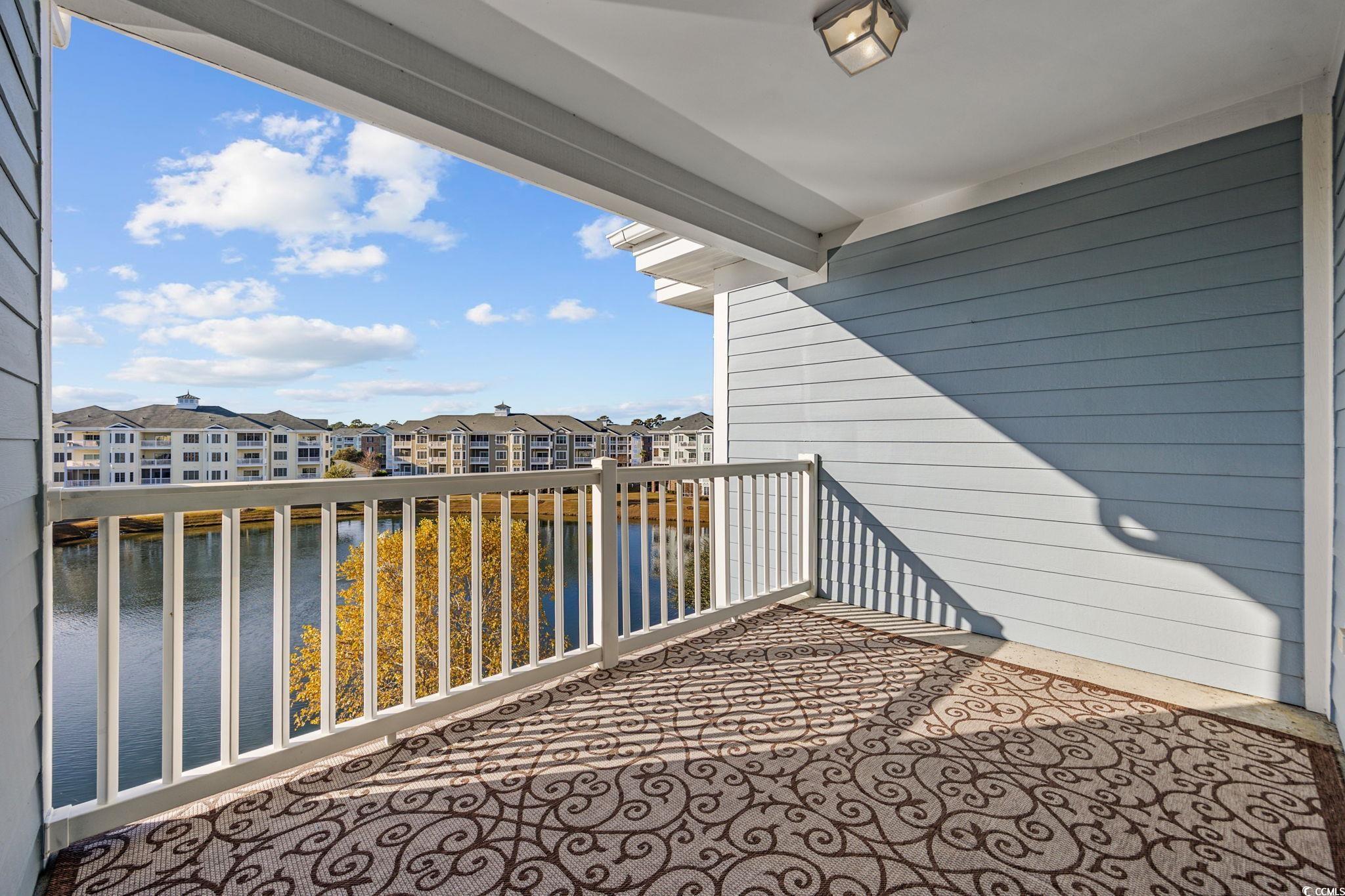 4847 Luster Leaf Circle, Unit 403 Myrtle Beach, SC 29577 - Photo 25 of 37 Balcony with a water view
