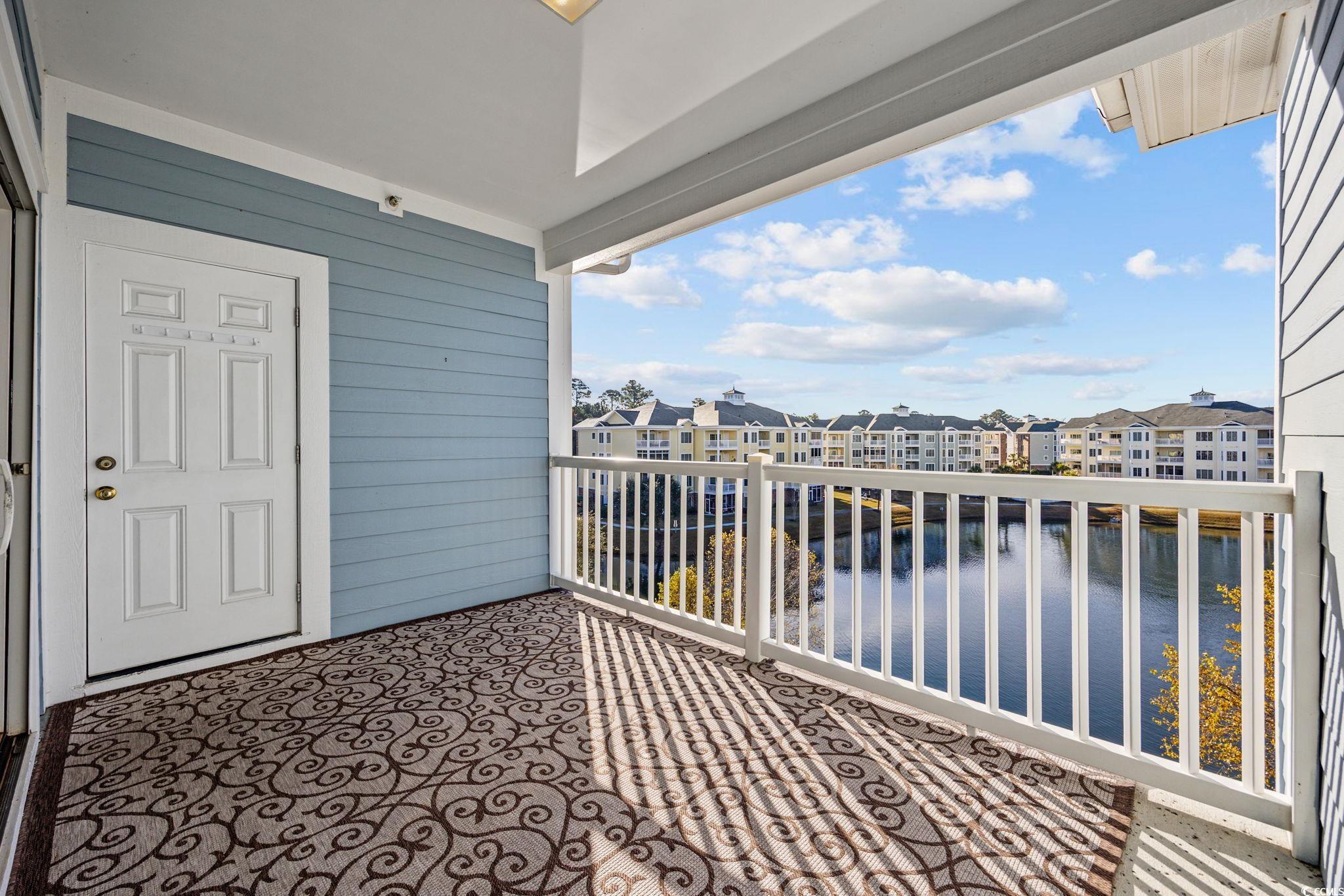 4847 Luster Leaf Circle, Unit 403 Myrtle Beach, SC 29577 - Photo 26 of 37 Balcony featuring a water view