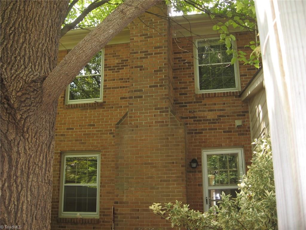 4923 Tower Road Greensboro, NC 27410 - Photo 9 of 11 back view of condo