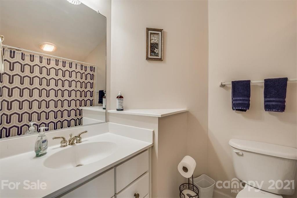 152 Melbourne Drive Fort Mill, SC 29708 - Photo 22 of 32 a bathroom with a sink toilet and mirror