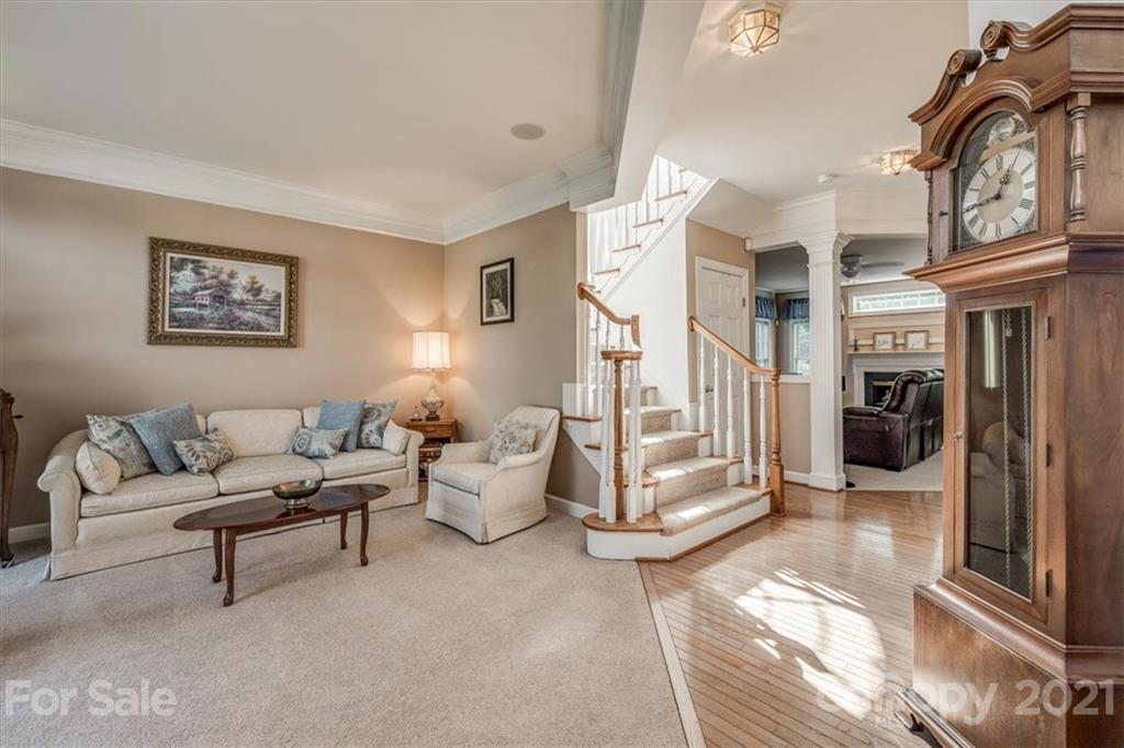 152 Melbourne Drive Fort Mill, SC 29708 - Photo 5 of 32 a living room with furniture and a rug