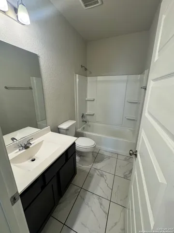 a view of balcony with wooden floor