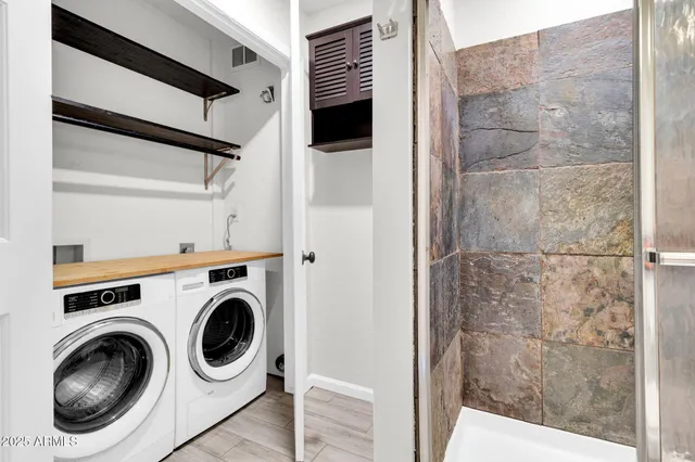 a utility room with dryer and washer