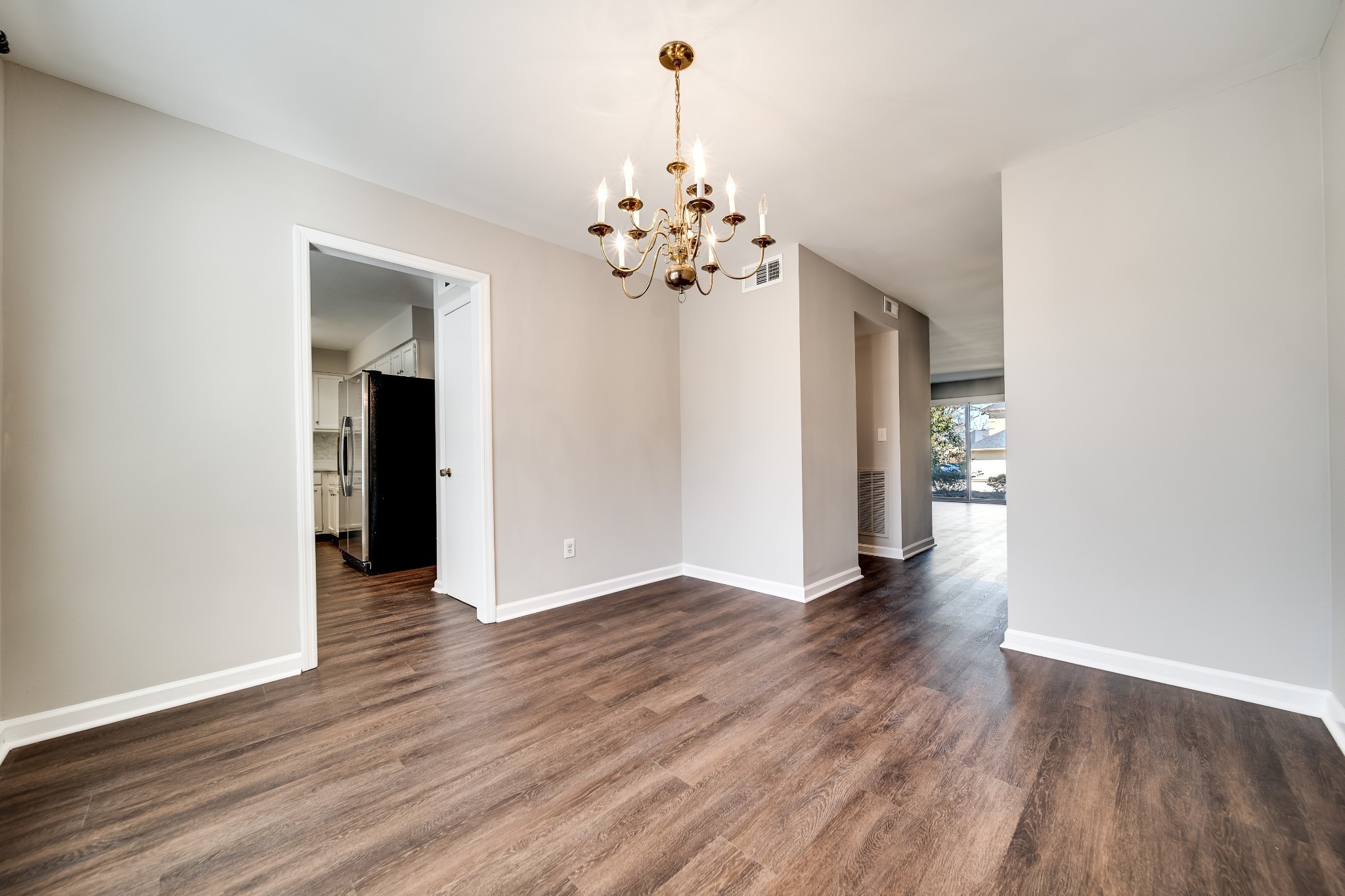 4487 Post Place, Unit 165 Nashville, TN 37205 - Photo 15 of 41 a view of an empty room with wooden floor
