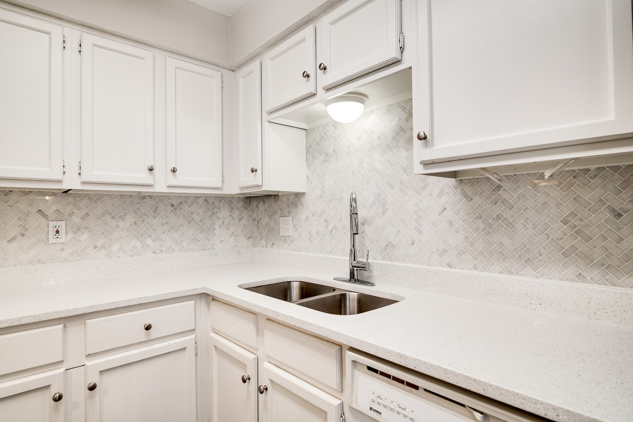 4487 Post Place, Unit 165 Nashville, TN 37205 - Photo 25 of 41 a kitchen with white cabinets and white appliances