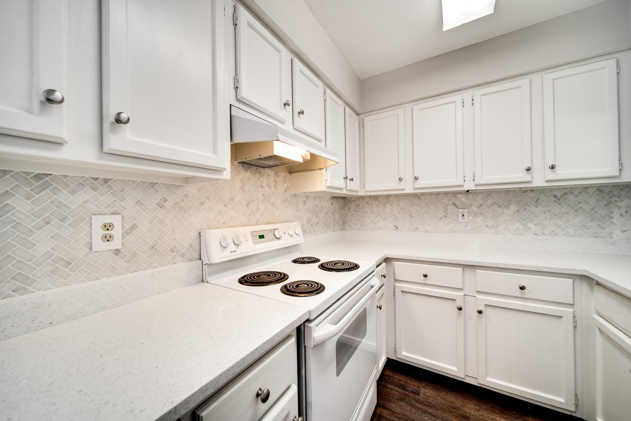4487 Post Place, Unit 165 Nashville, TN 37205 - Photo 27 of 41 a kitchen with white cabinets and white appliances