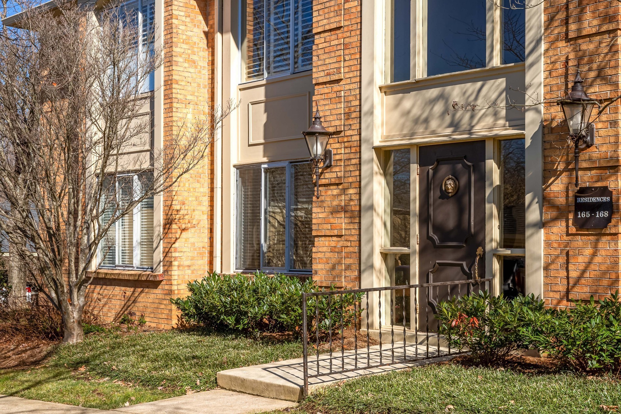 4487 Post Place, Unit 165 Nashville, TN 37205 - Photo 5 of 41 a view of a building with a yard