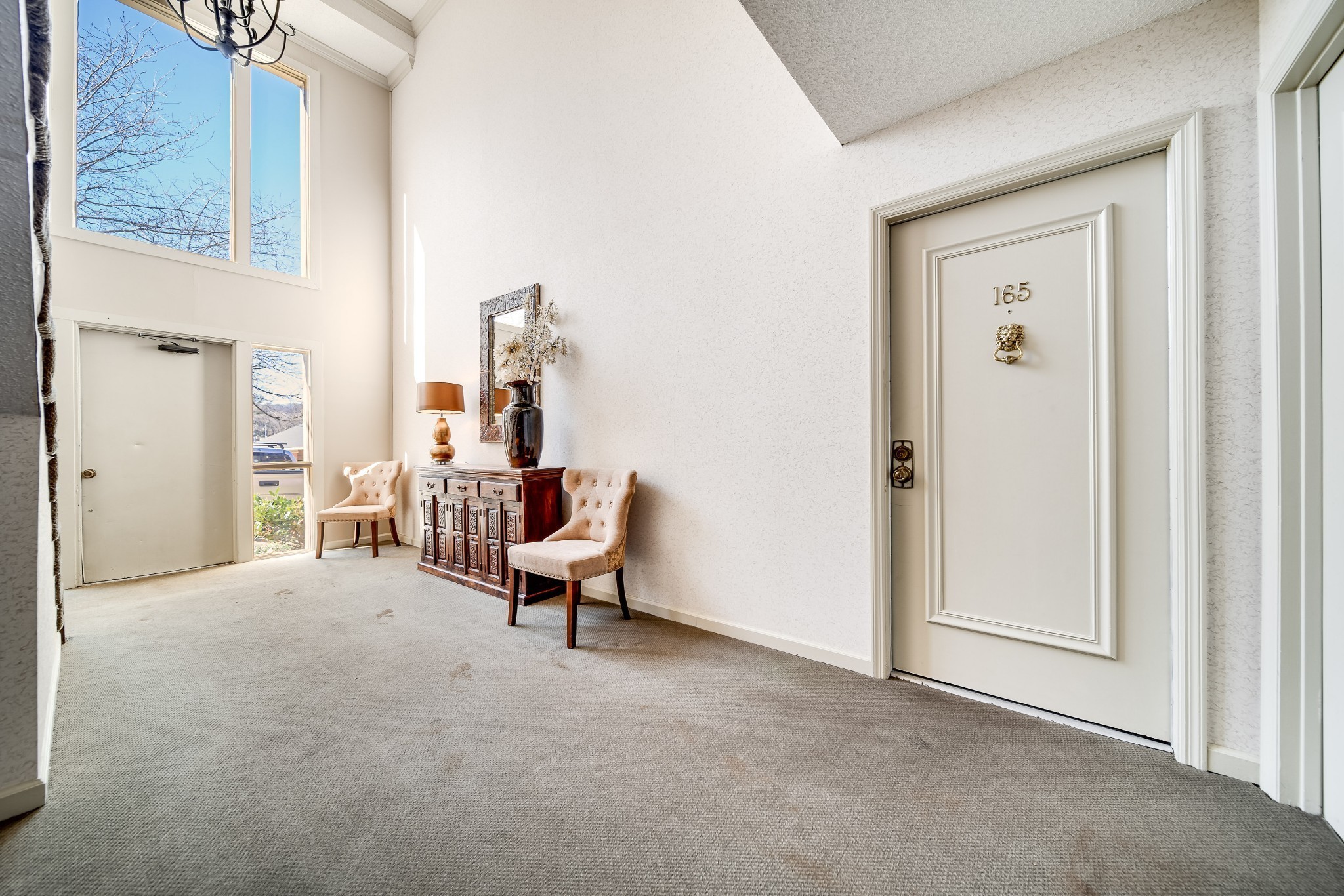 4487 Post Place, Unit 165 Nashville, TN 37205 - Photo 7 of 41 a view of a livingroom with furniture and an entryway