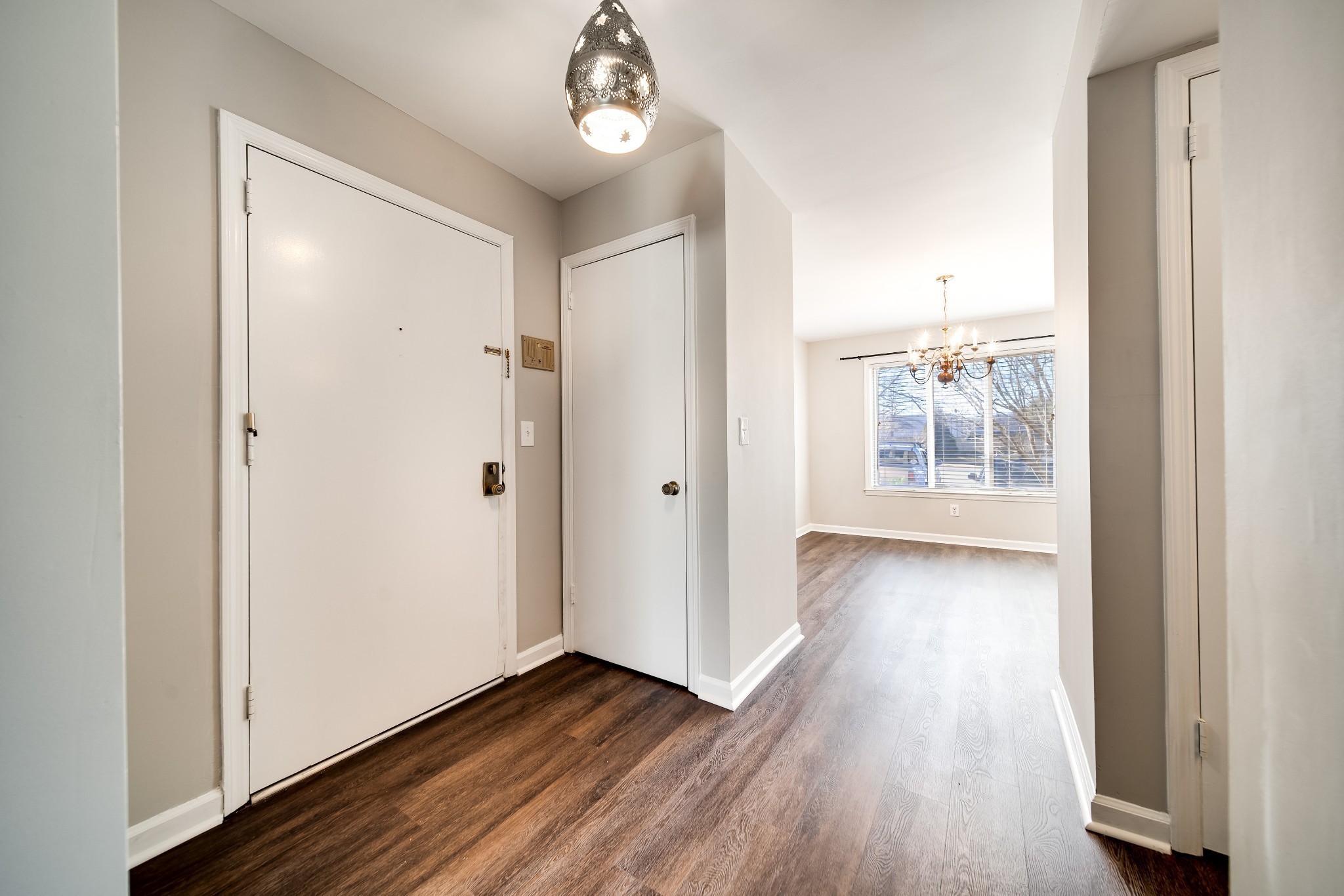 4487 Post Place, Unit 165 Nashville, TN 37205 - Photo 8 of 41 a view of a hallway with wooden floor