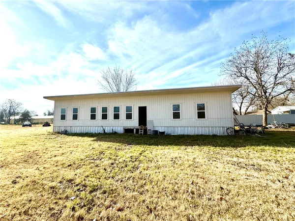 a view of a house with a big yard