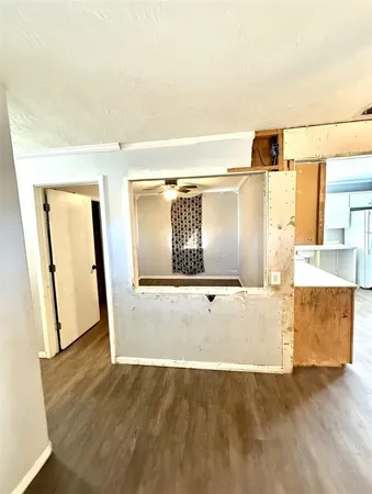 view of a living room with a large window