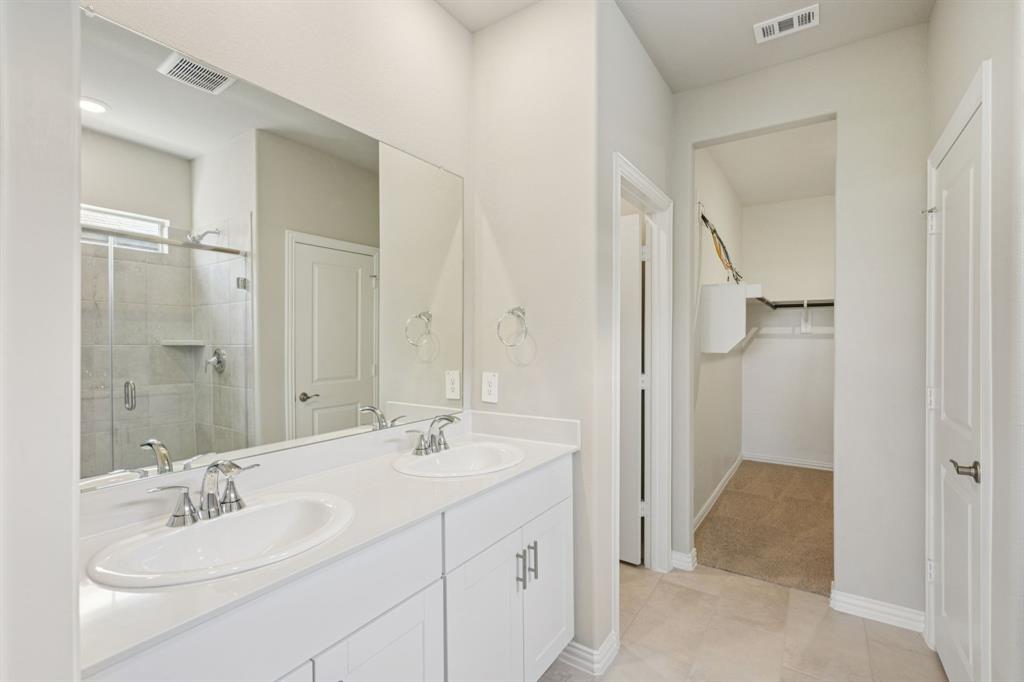 1629 Arches Road Anna, TX 75409 - Photo 20 of 37 Photo is not of the actual home, but is an inspirational photo of builder’s model home and may depict options, furnishings, and/or decorator features that are not included.