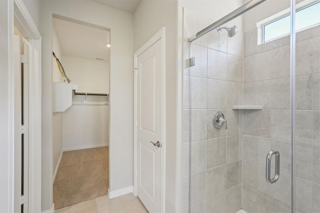 1629 Arches Road Anna, TX 75409 - Photo 21 of 37 Photo is not of the actual home, but is an inspirational photo of builder’s model home and may depict options, furnishings, and/or decorator features that are not included.