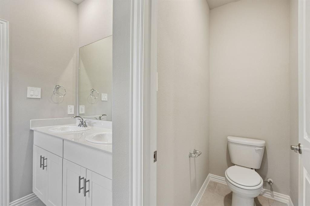 1629 Arches Road Anna, TX 75409 - Photo 23 of 37 Photo is not of the actual home, but is an inspirational photo of builder’s model home and may depict options, furnishings, and/or decorator features that are not included.