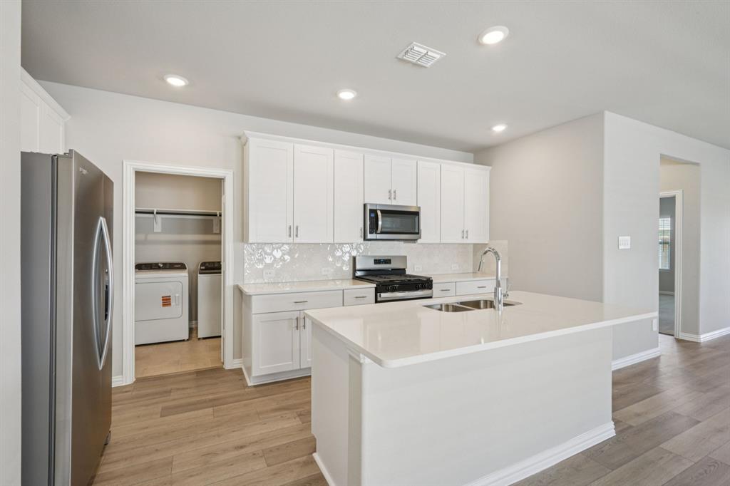 1629 Arches Road Anna, TX 75409 - Photo 3 of 37 Photo is not of the actual home, but is an inspirational photo of builder’s model home and may depict options, furnishings, and/or decorator features that are not included.