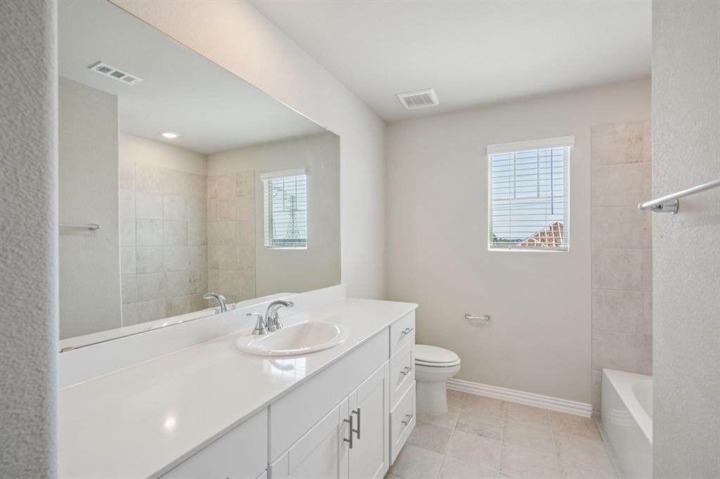 1629 Arches Road Anna, TX 75409 - Photo 35 of 37 Photo is not of the actual home, but is an inspirational photo of builder’s model home and may depict options, furnishings, and/or decorator features that are not included.