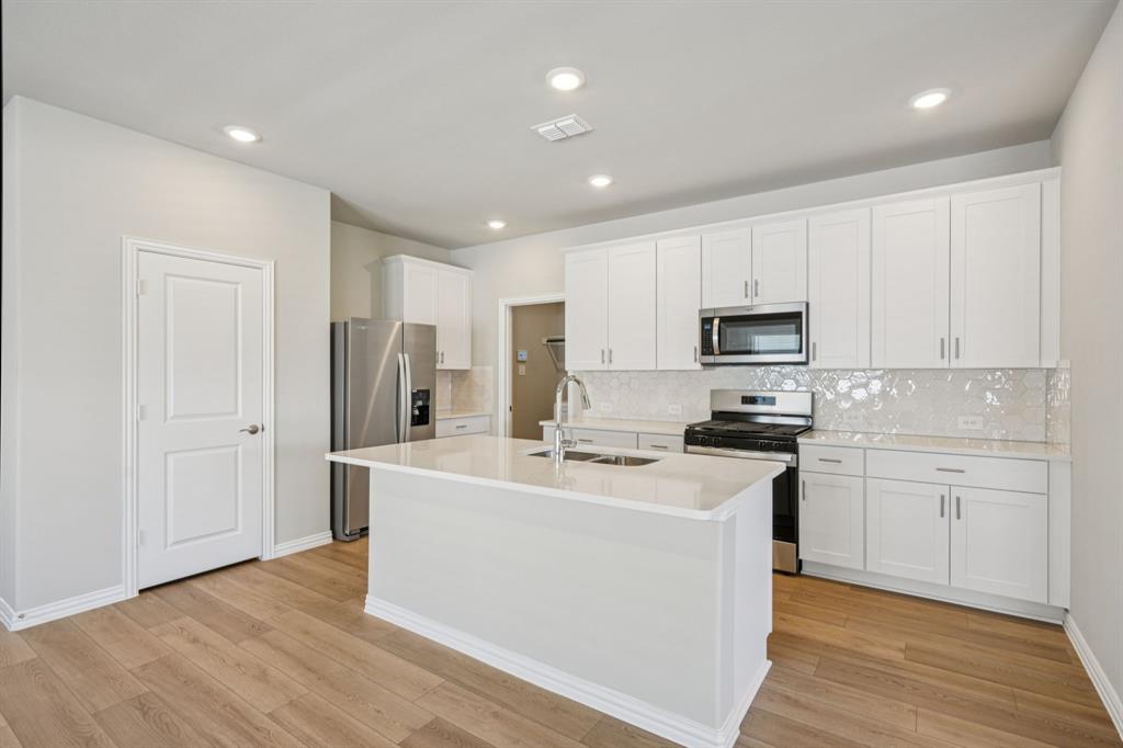 1629 Arches Road Anna, TX 75409 - Photo 4 of 37 Photo is not of the actual home, but is an inspirational photo of builder’s model home and may depict options, furnishings, and/or decorator features that are not included.