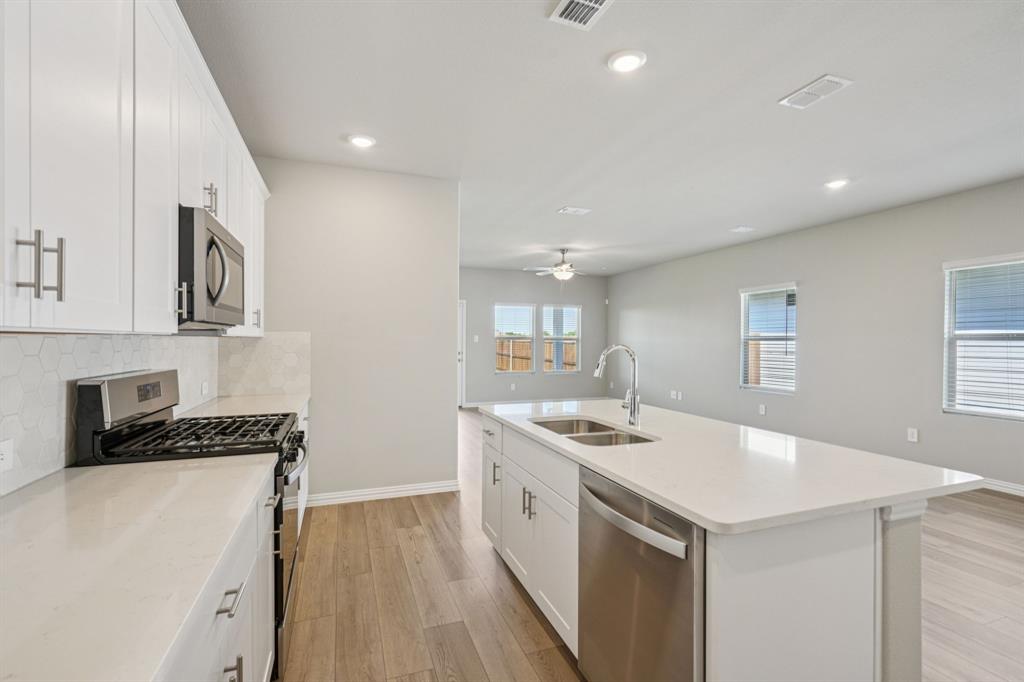 1629 Arches Road Anna, TX 75409 - Photo 6 of 37 Photo is not of the actual home, but is an inspirational photo of builder’s model home and may depict options, furnishings, and/or decorator features that are not included.