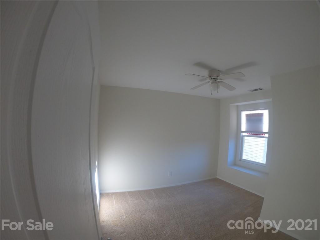 718 Elders Story Road Fort Mill, SC 29708 - Photo 6 of 13 an empty room with a window
