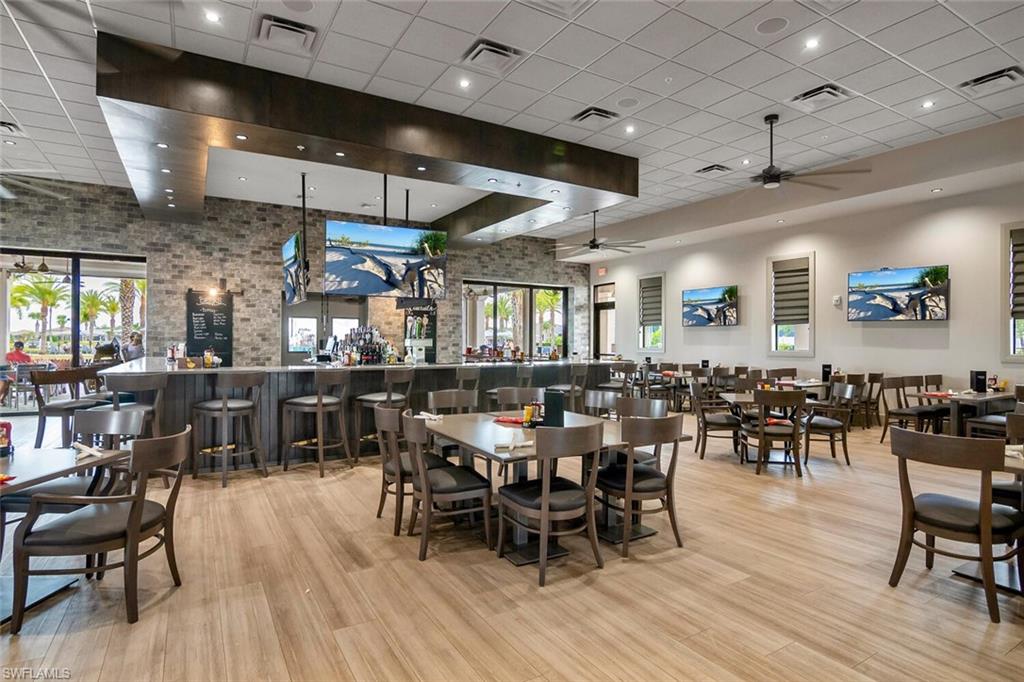 17574 Ashcomb Way Estero, FL 33928 - Photo 32 of 32 a view of a dining area with furniture