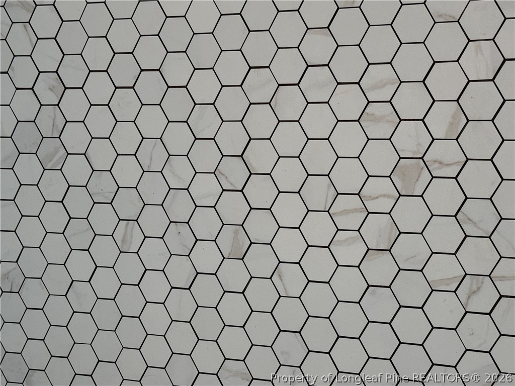 215 Whispering Ridge West End, NC 27376 - Photo 17 of 19 tile in primary bathroom