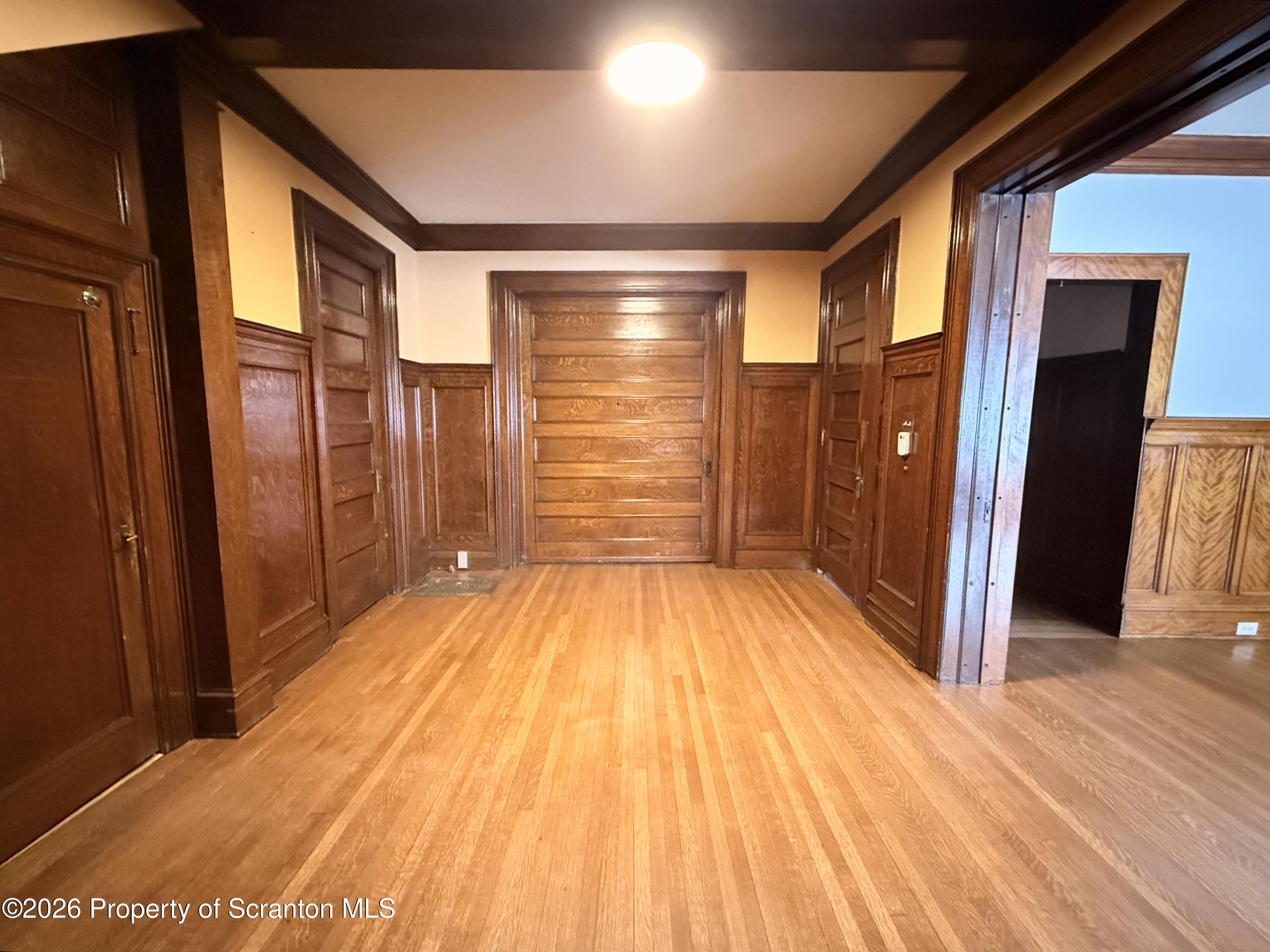 629 Clay Avenue, Unit 1 Scranton, PA 18510 - Photo 2 of 15 a view of empty room with wooden floor