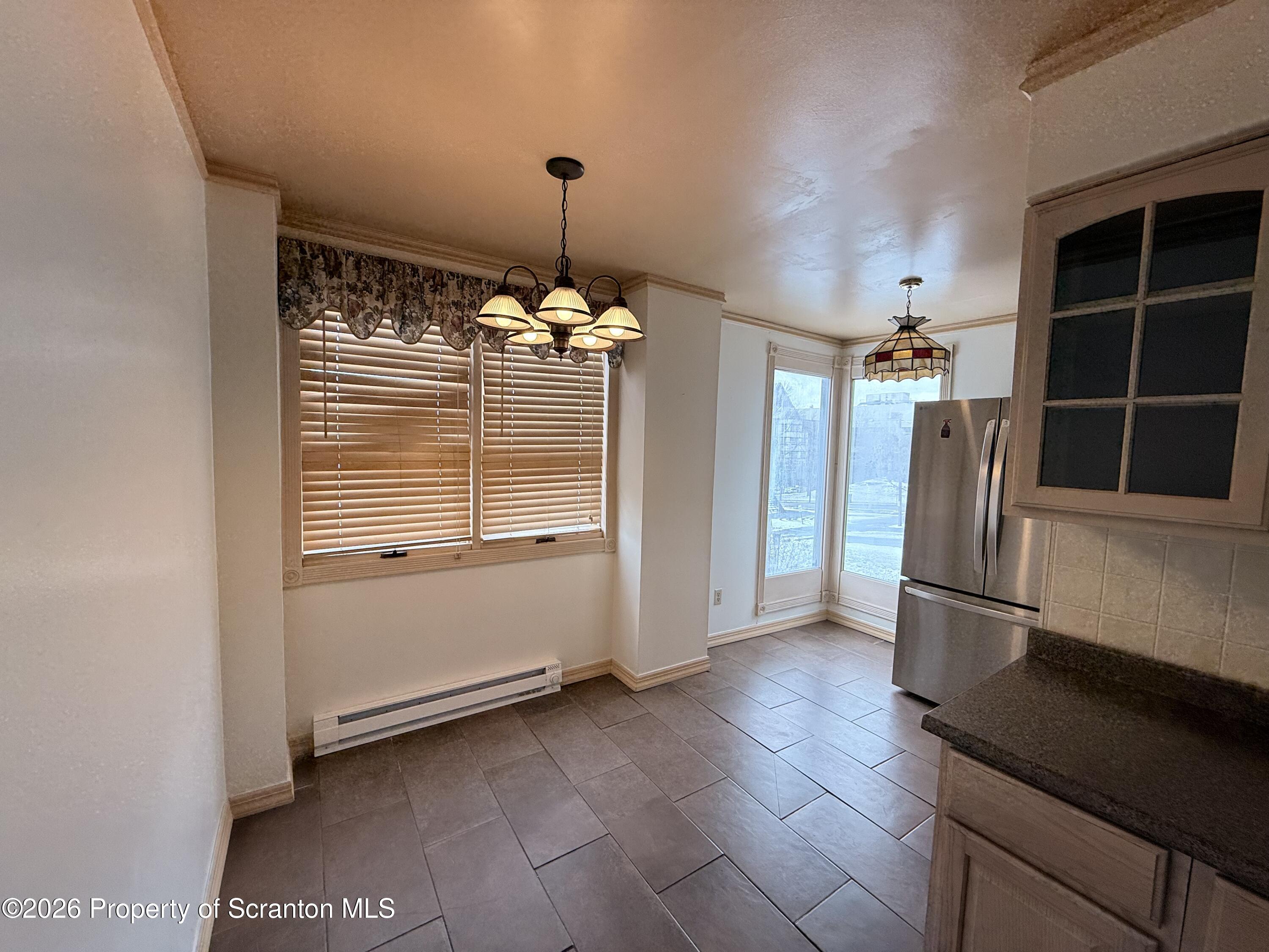629 Clay Avenue, Unit 1 Scranton, PA 18510 - Photo 9 of 15 a view of a kitchen with a sink and dishwasher in kitchen