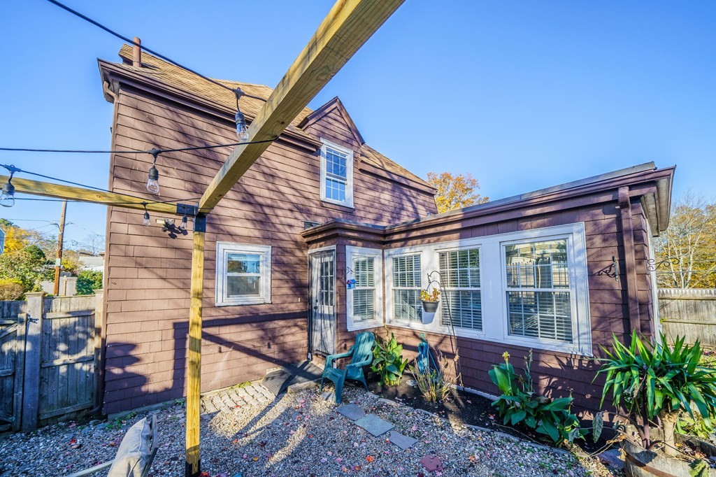 8 Samoset Road Dedham, MA 02026 - Photo 31 of 35 a front view of a house with garden