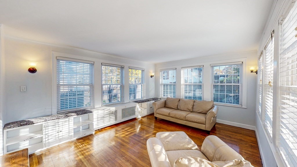 8 Samoset Road Dedham, MA 02026 - Photo 7 of 35 a living room with furniture and a large window